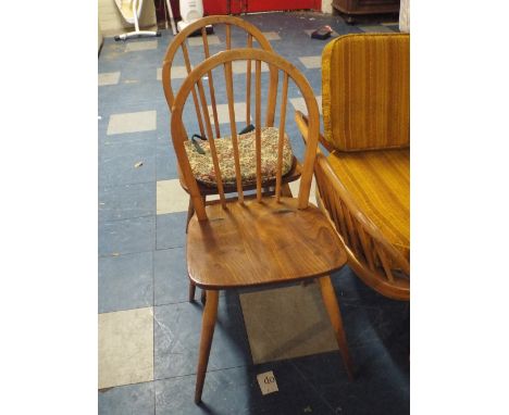 Two Seated Ercol Spindle Back Dining Chairs