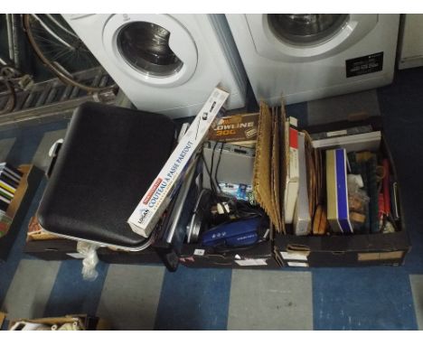 A Collection of Four Boxes of Sundries to include Sewing Accessories, Light Bulbs, Table Lamps, Brief Case, Reading Lamp etc 