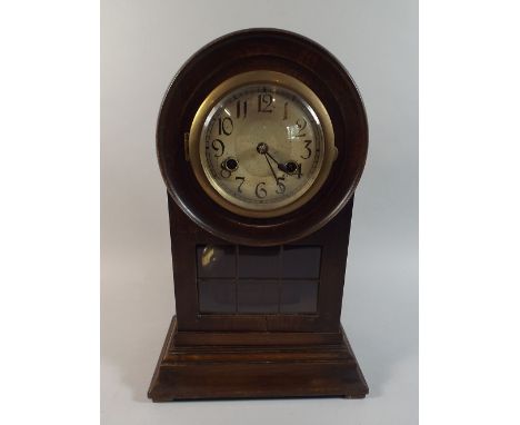 An Edwardian Oak Framed Dome Topped Mantle Clock with Glazed Pendulum Window, 38cm high 