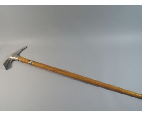 A Souvenir Alpine Ice Axe with Floral Decoration, 90cm Long 