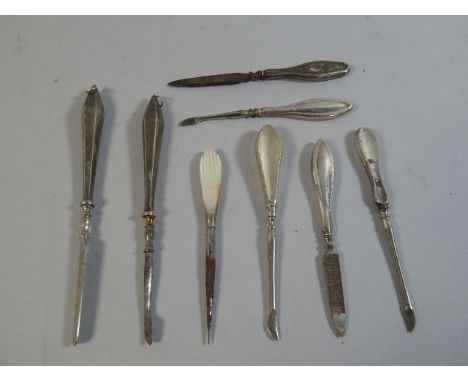 A Collection of Eight Silver Mounted Manicure Tools