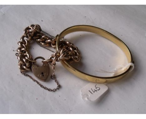 Rolled gold bangle & another      