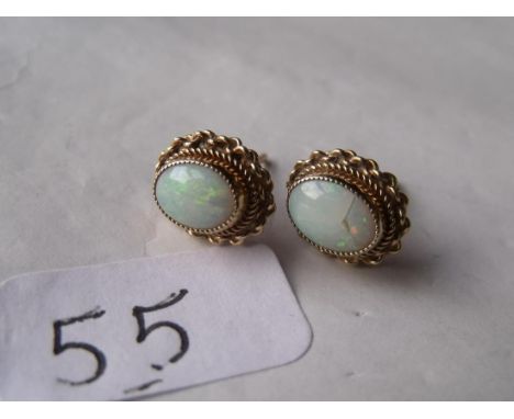 Pair opal ear studs in rope twist borders     