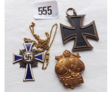 A two colour enamel cross back dated December  1938 and signed and a 1939 iron cross and another   