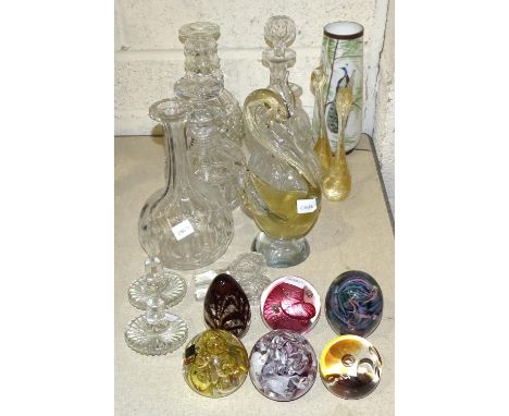 A pair of cut-glass decanters, 21cm high, (one without stopper), three other glass decanters, three Murano glass bird ornamen