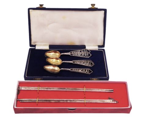 Set of six Chinese silver spoons, each with pierced 'Shanghai' handles, in fitted case, together with a pair of sterling silv