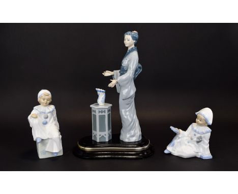 A Collection Of Cascade Ceramic Figures Three in total to include large geisha figure on black wooden plinth, also two small 