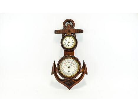 Antique Barometer With Intergrated Clock Wall mounted barometer in the form of an anchor with small clock to top section. Fas