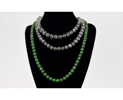 A Pair Of Vintage Necklaces The first, a long beaded malachite necklace of plain form with screw clasp fastening. The second,