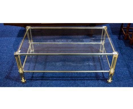 Lacquered Brass Two Tier Coffee Table with lower storage shelf. 15 inches high 36 by 21 inches high.