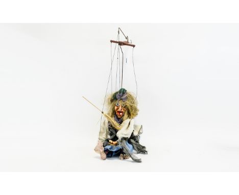 Vintage String Puppet In the form of a scary witch complete with straw broomstick. Approx height 21 inches.