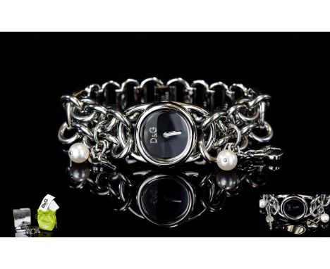 Ladies Contemporary Fashion Watch By D&G Silver tone chunky bracelet watch with black dial and silver tone hands. The bracele