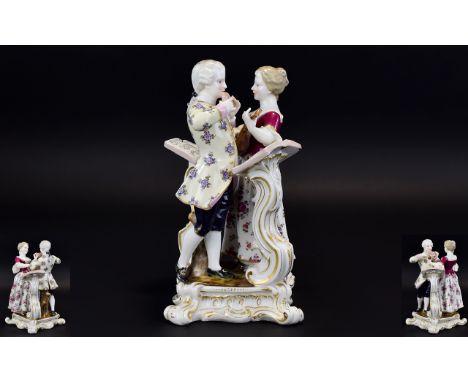 German Figure Group of a Couple Playing a Duet, the pair standing side by side, facing each other, both with a scrolled stand