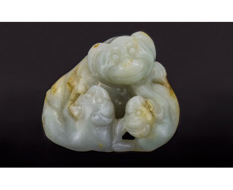A Chinese Qing Dynasty White Jade Lamb. 85.4 grams. 1.5 x 2.25 Inches. 