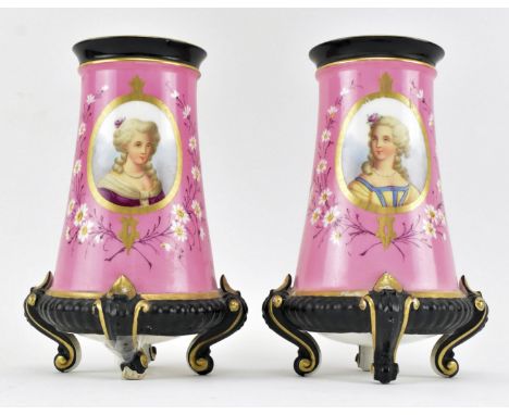 A pair of likely French 19th century porcelain footed vases in the manner of Sevres. Each with black band to rim, tapering bo