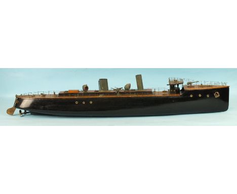 A scratch-built model of an armed river boat, the "Douro", fitted with a battery powered engine, the "planked" deck with deta