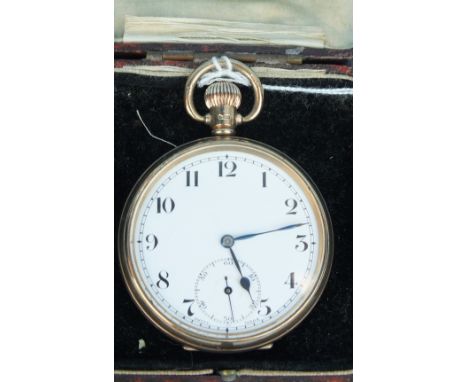 An open face keyless pocket watch, the white enamel dial with Arabic numerals and seconds subsidiary, in plain 9ct gold Denni