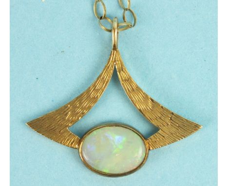 A modern 9ct gold pendant set opal, on 9ct gold chain, total weight 4.3g.