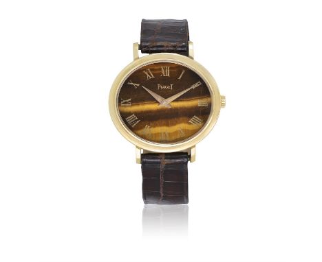 PIAGET REF. 9801, 18K YELLOW GOLD, TIGER’S EYE DIALAn18K yellow gold oval shaped, with tiger’s eye dial manual winding wristw