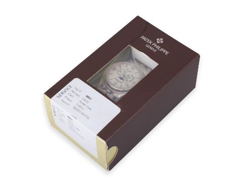 PATEK PHILIPPEREF. 5146/1G, 18K BRACELET, SEALED, FULL SETA rare 18k white gold, annual calendar, automatic wristwatch with m