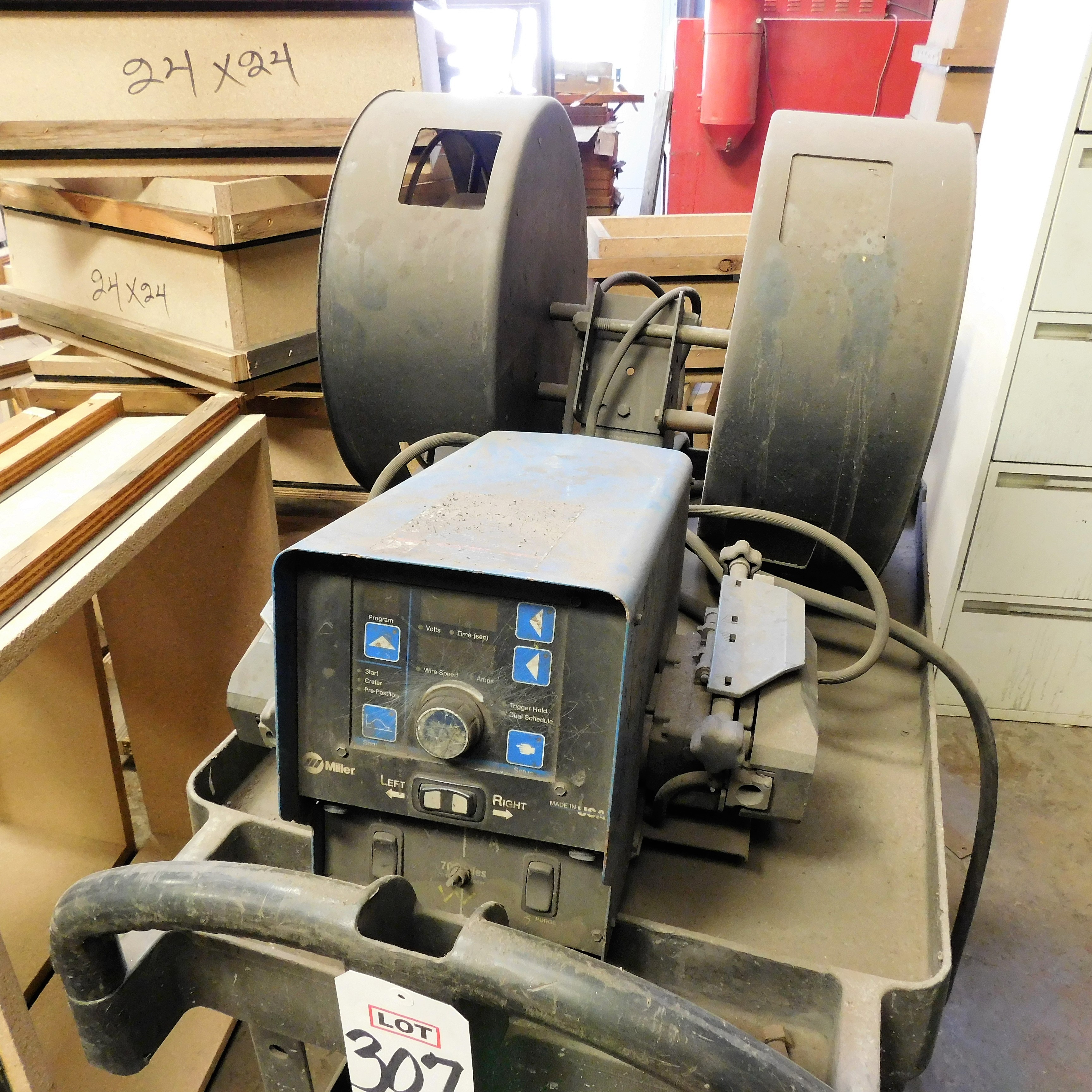 MILLER ELECTRIC DUAL WIRE FEEDER, MODEL D74DX, S/N LJ230247U, W/ CART