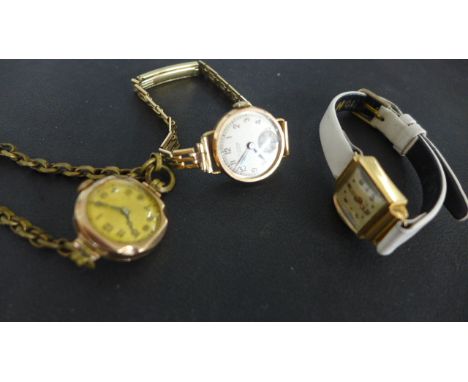 Two 9ct gold ladies manual wind wristwatches with plated straps both working in the sale room - and an 18ct gold ladies manua