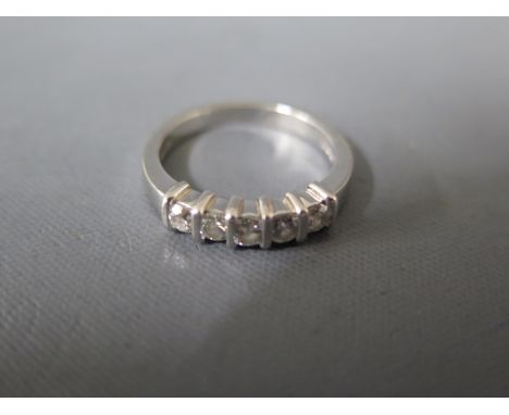 A platinum five stone diamond ring size K - weight approx 4.7 grams - dated 1998