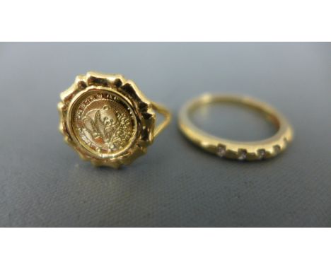 A 10ct yellow gold ring with a panda token set to shoulder and a 9ct yellow gold ring set with five small diamonds to shoulde