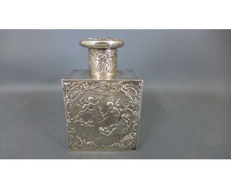 A Continental silver embossed lidded tea caddy flask - approx weight 5 troy oz - in good condition, has a few minor dents to 