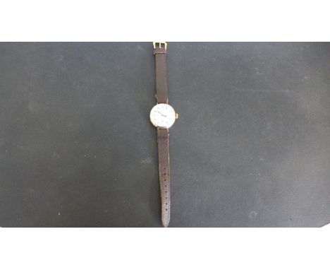 A rose gold cased Trench watch with Arabic numerals on white enamel dial - Rolex - R.W.C on inner 9ct gold case with subsidia