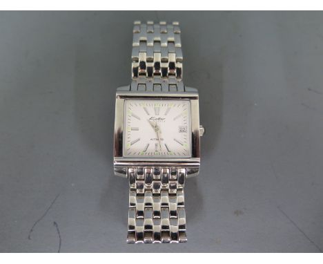 A Gents Kolber Eta automatic movement wristwatch in stainless steel case with matching bracelet strap, white dial with baton 