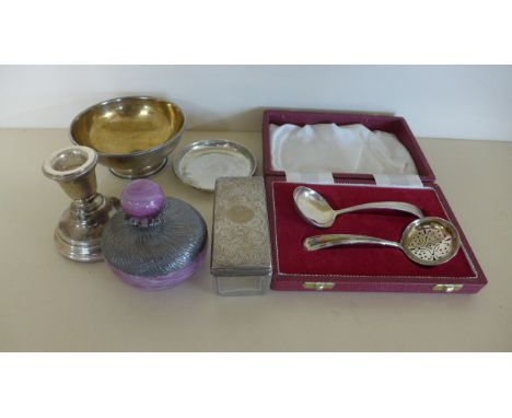 Hallmarked silver including a William IV caddy spoon, strainer spoon, glass silver topped pin tray, candlestick, bowl and sma