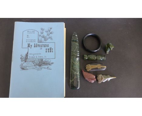 A Nephrite jade native American totum, a Zuni Fetish horned devil lizard, a spiny anteater, black onyx bangle and a large Nep
