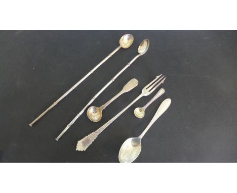 Three silver spoons and a pickle fork - approx weight 2 troy oz - and two white metal tea straw spoons - Length 23cm - some u
