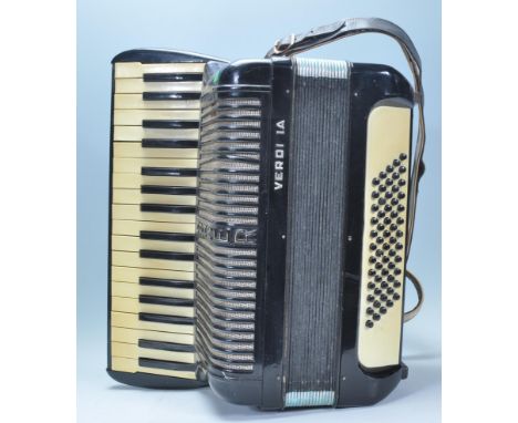 Musical Instruments. A vintage 20th century Hohner accordion&nbsp; in a black colourway having makers mark through the centre