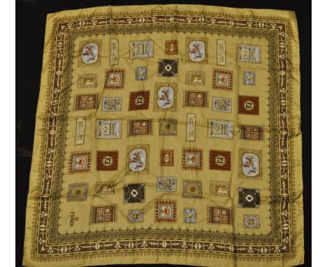 A vintage ladies Fendi Italian silk scarf having a beige ground with postage stamp decoration. Marked Fendi with 100% silk la