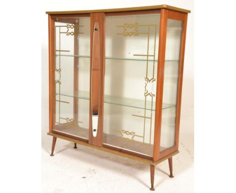 A vintage 20th Century wooden bookcase / shelf having glass panelled doors and sides, with two shelves within, the doors havi