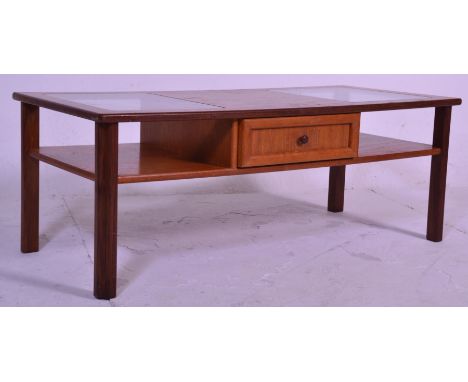 A retro mid 20th Century teak wood coffee table of rectangular form having twin inset glass panels atop with a single central