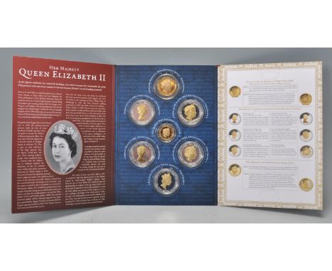 A Queen Elizabeth II 90th birthday coin collectors set in its presentation pack with original certificates to include a 9ct g