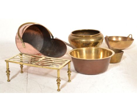 A lot of Victorian 19th century copper to include a copper coal scuttle, unusual large metal handled jam pan, brass trivet, d