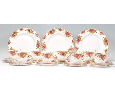 A vintage 20th Century Royal Albert Old Country Roses set of eight cups, saucers and side plates (eight trios) and three sand