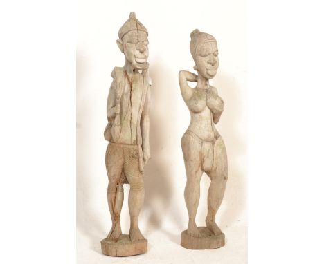 A large pair of vintage 20th Century carved wooden African&nbsp;fertility figures. Tallest measures 94 cm tall.&nbsp;