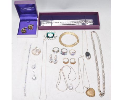 A collection of silver and fashion jewellery to include a gold plated flat link bracelet, a pair of glass panel cufflinks, a 