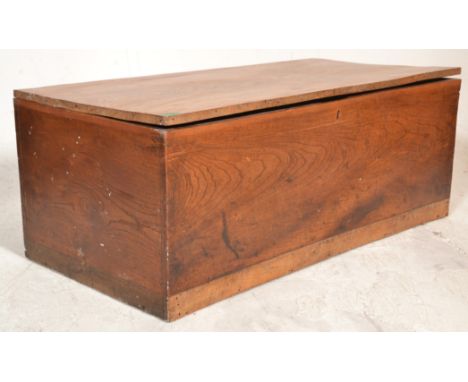 A 19th century Victorian elm wood coffer / blanket box chest. Of rectangular form with plain panel sides and front with a hin
