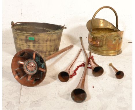 A collection of 19th Century antique metal wares to include a copper 'The Swift' washing posser, a group of four copper hunti