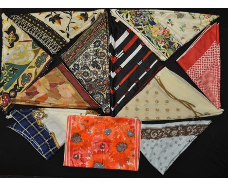 A group of ten vintage silk scarves to include DKNY, Aquascutum, Pastotimes, Echantal etc. In a wide selection of designs, mo