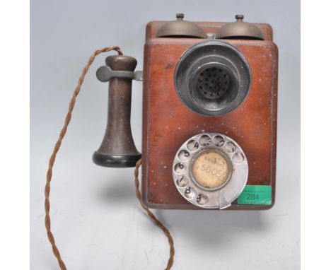 A vintage GPO&nbsp; TE30 234 N2121 early 20th century telephone with mahogany box earpiece on cord with speaker over spin dia