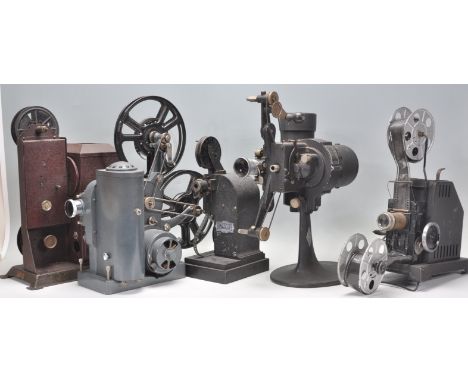 A group of five vintage cine projectors to include a Bell and Howell filmo 5.7 projector, a Kodak Kodatoy projector, a pailla