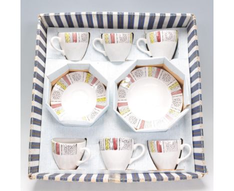 A vintage retro 1960's Kathie Winkle Bridgewood pattern tea service consisting of six cups and saucers and side plates.