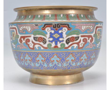 An early 20th Century Chinese cloisonne&nbsp;brass and enamel planter / plant pot. The enamel champleve decoration with geome